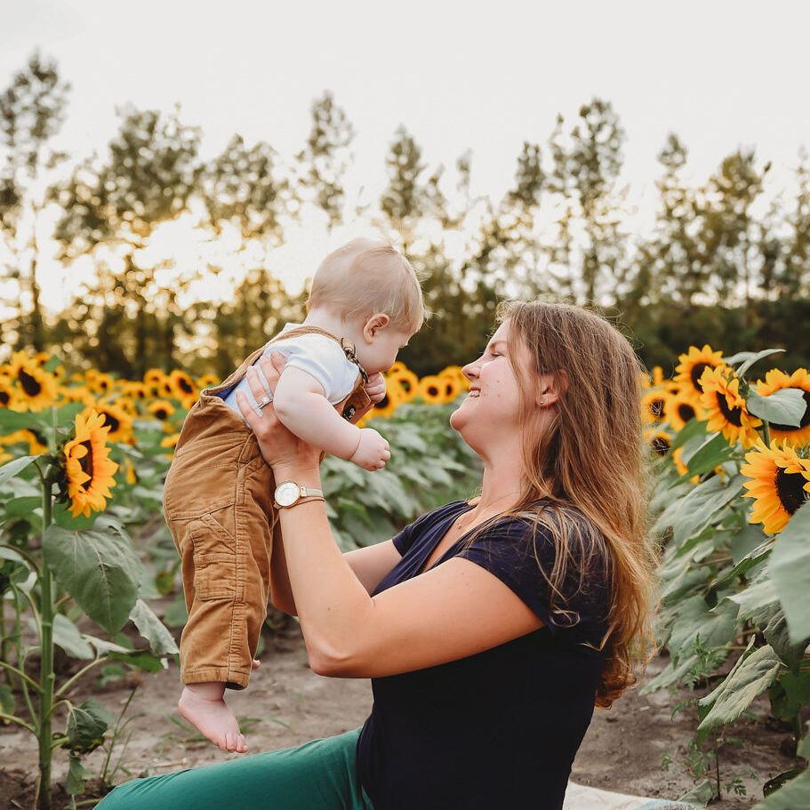 Mother and sun in sunflowers